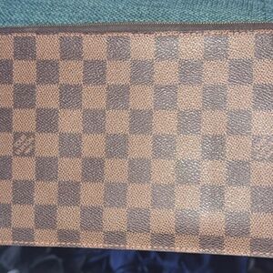 Louis Vuitton never full clutch wallet